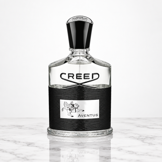 Creed Aventus bottle on white marble table
