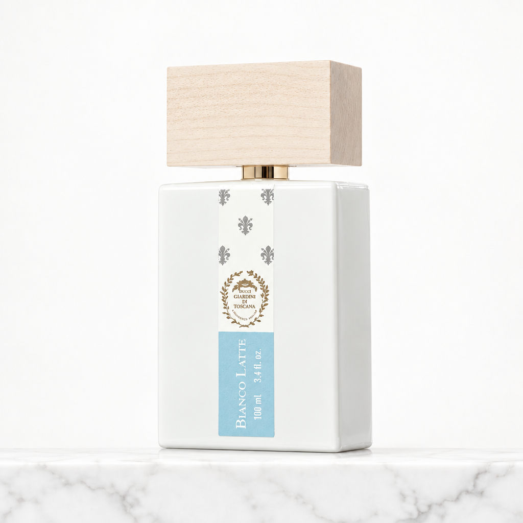 Giardini di Toscana Bianco Latte Eau de Parfum on a soft white background with marble base